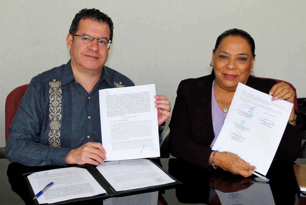 Firma de convenio - Foto 1