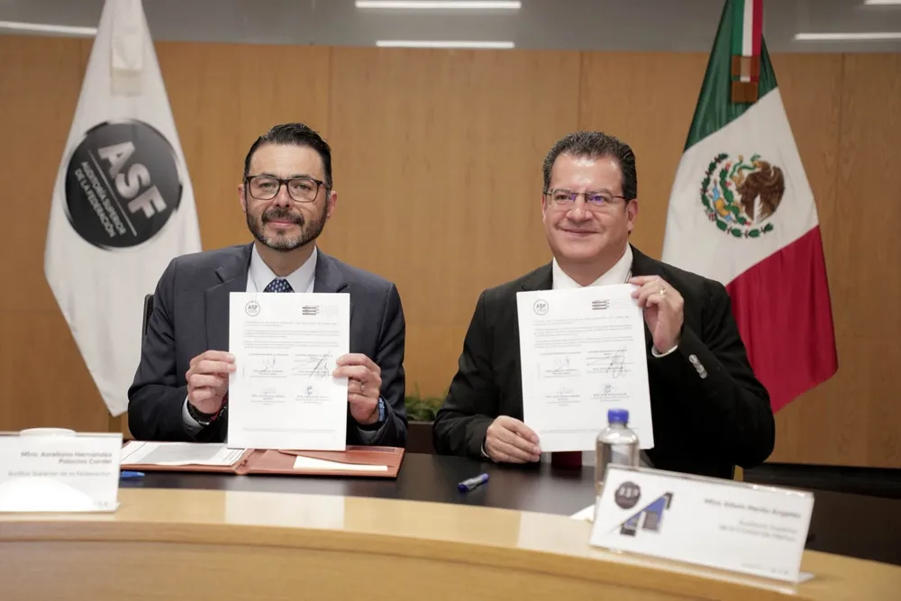 Firma de convenio - Foto 1